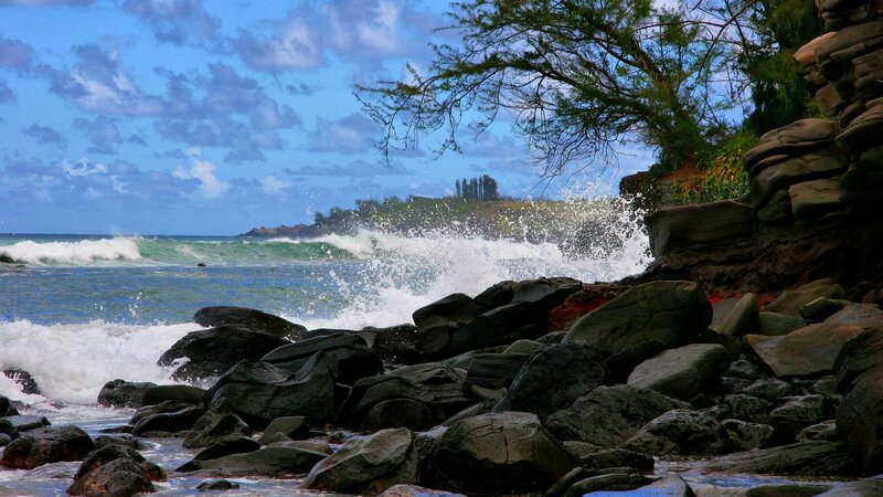 Waves crashing on rocky shore