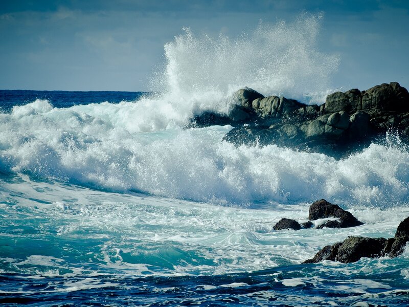 Waves crashing on rocky shore