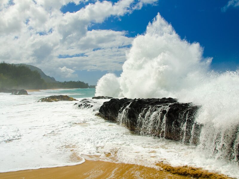 Waves crashing on rocky shore