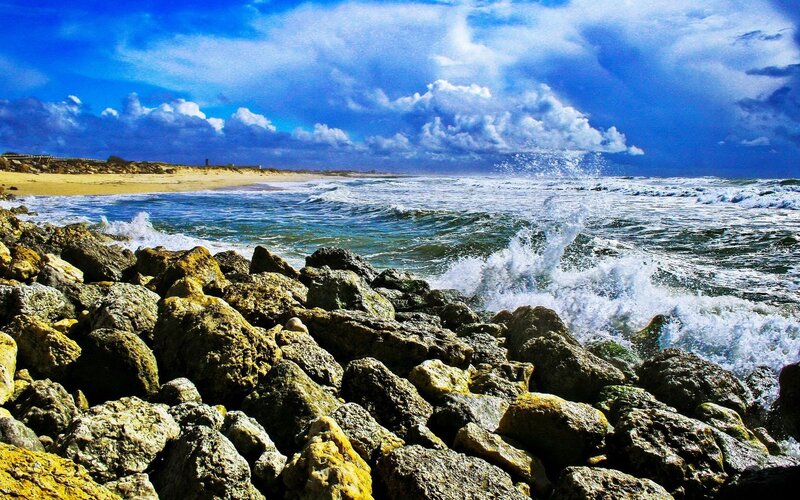 Waves crashing on rocky shore