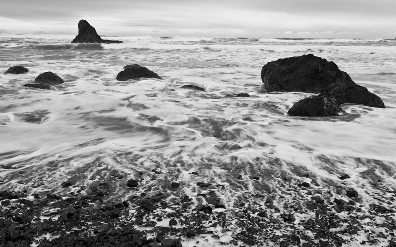 Waves crashing on rocky shore