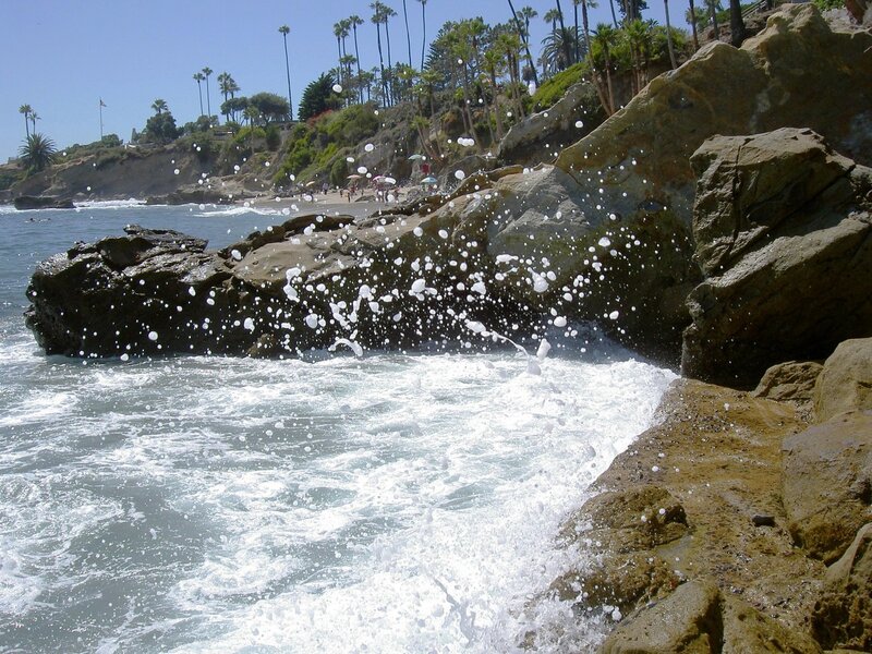 Waves crashing on rocky shore
