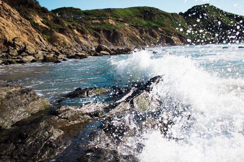 Waves crashing on rocky shore