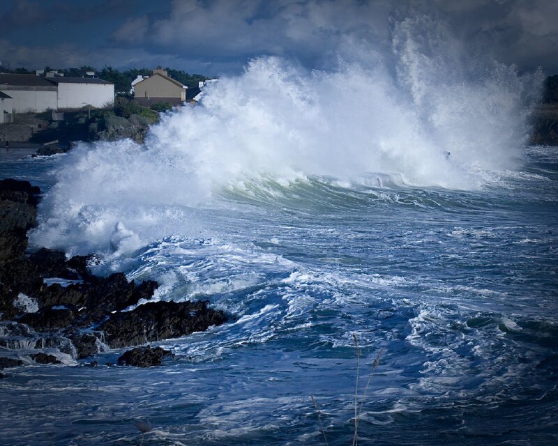 Waves crashing on rocky shore