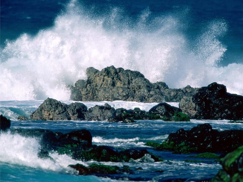 Waves crashing on rocky shore