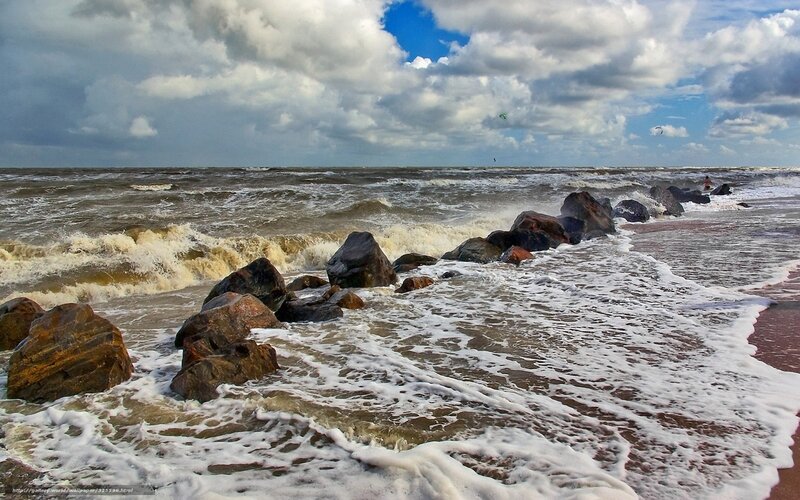 Waves crashing on rocky shore