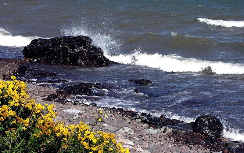 Waves crashing on rocky shore