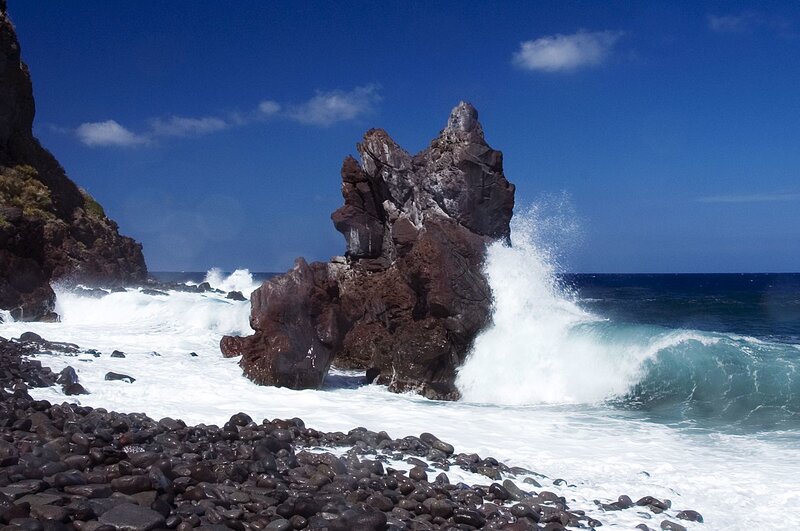 Waves crashing on rocky shore
