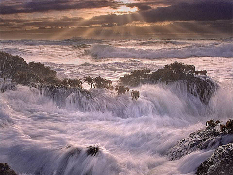Waves crashing on rocky shore
