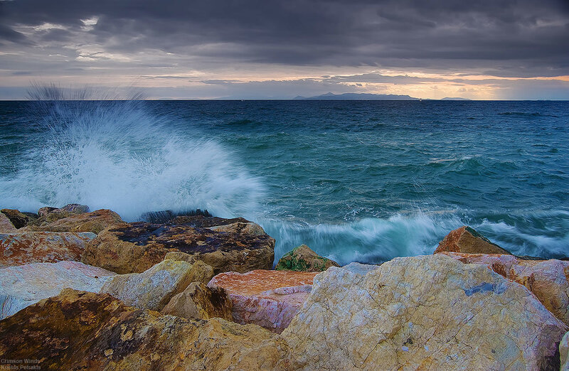 Waves crashing on rocky shore