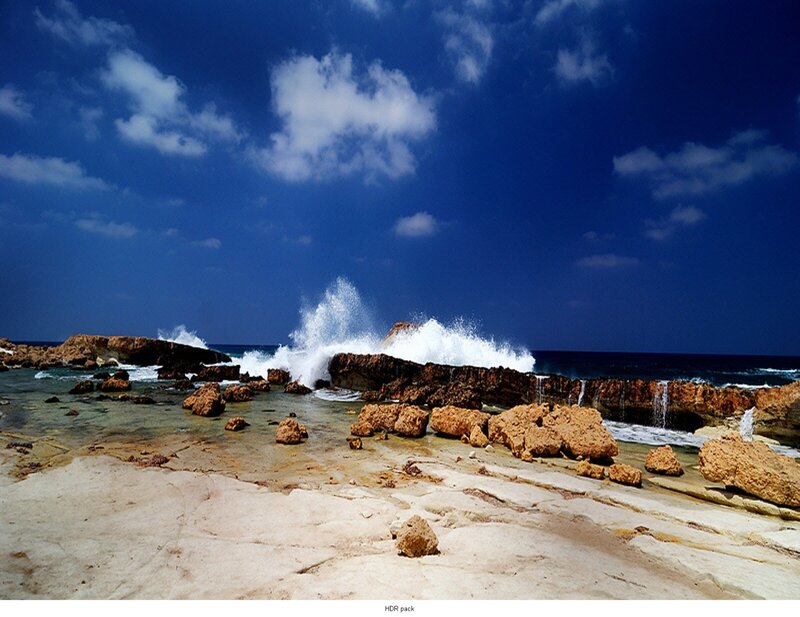 Waves crashing on rocky shore