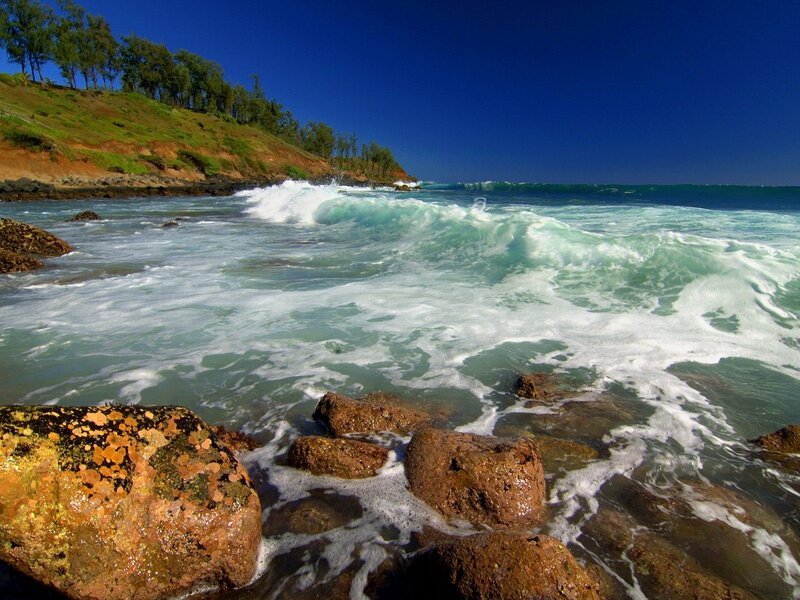 Waves crashing on rocky shore