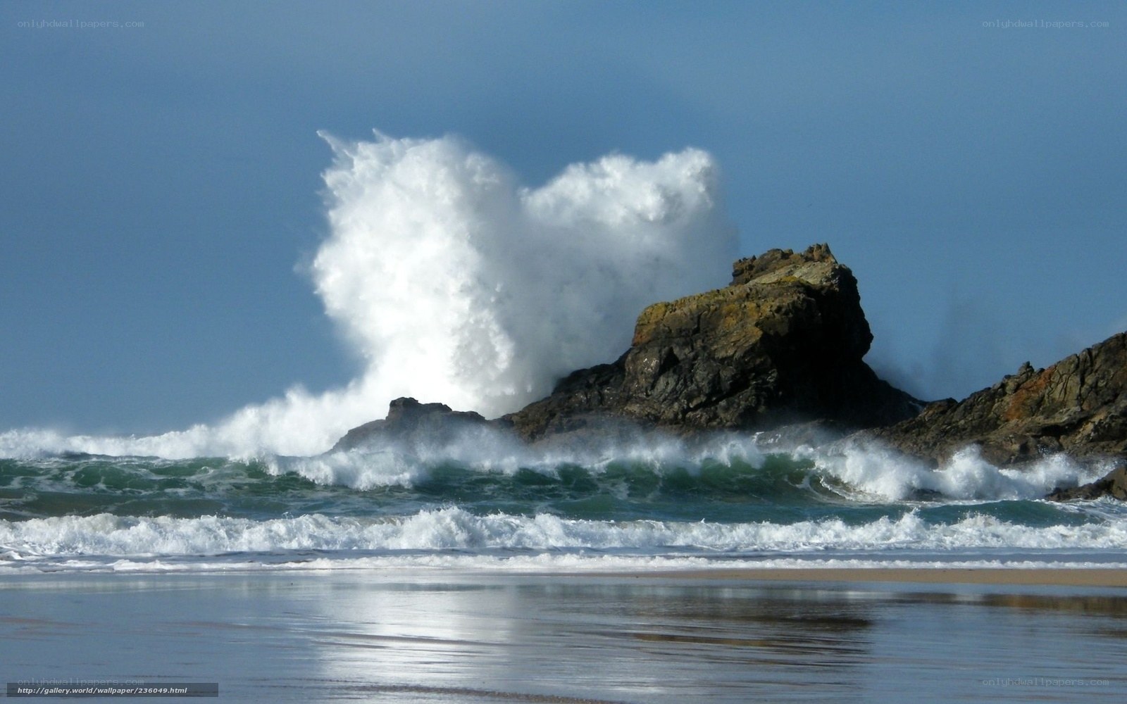 Waves crashing on rocky shore