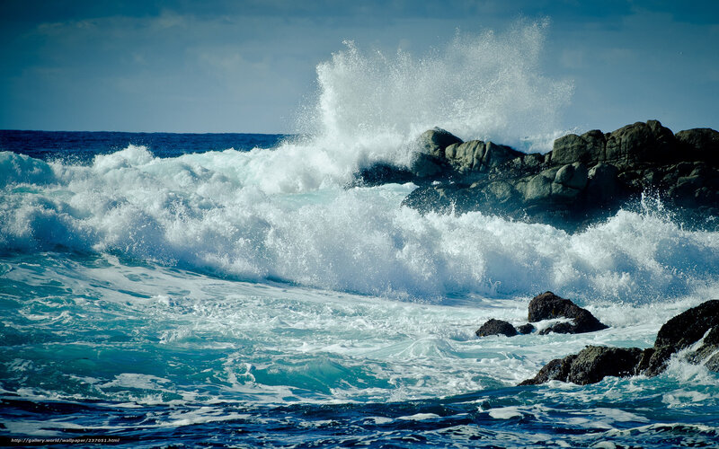 Waves crashing on rocky shore