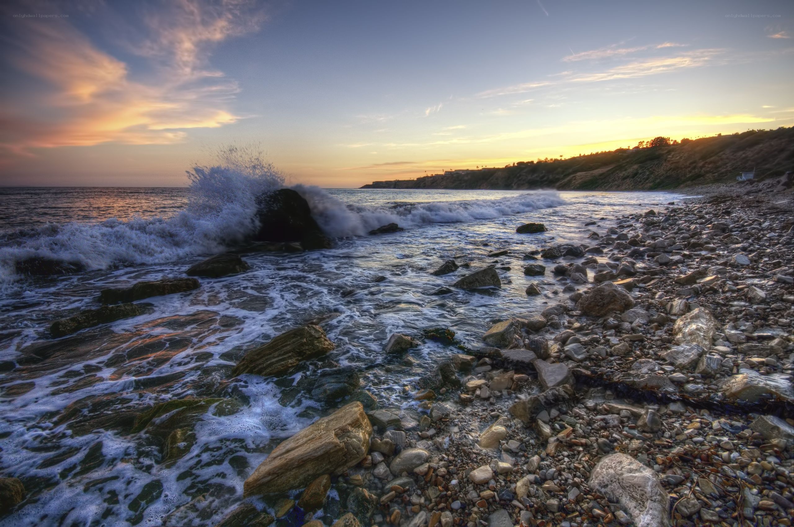 Waves crashing on rocky shore