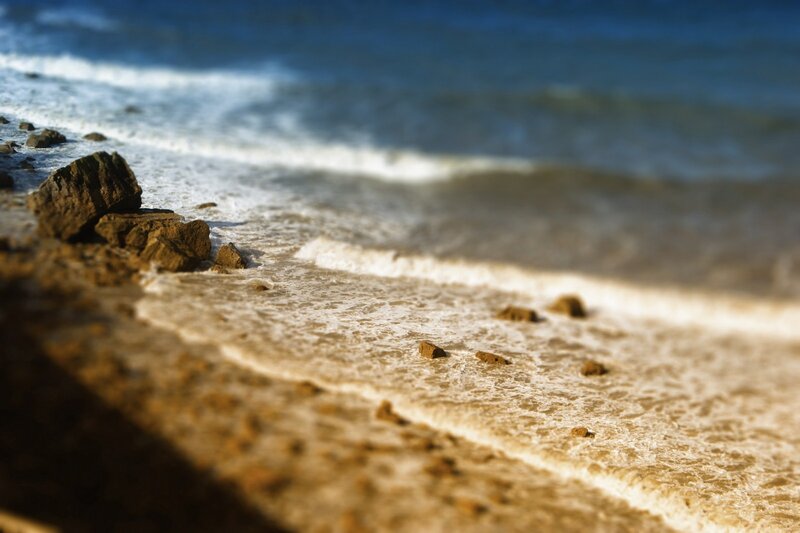 Waves crashing on rocky shore