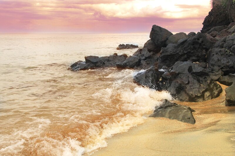 Waves crashing on rocky shore