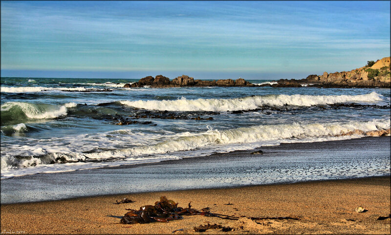 Waves Crashing on Rocky Shore — Blue