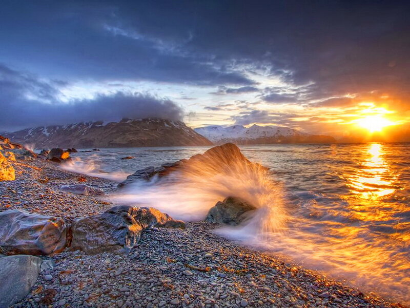 Waves Crashing on Rocky Shore — Orange, Dramatic