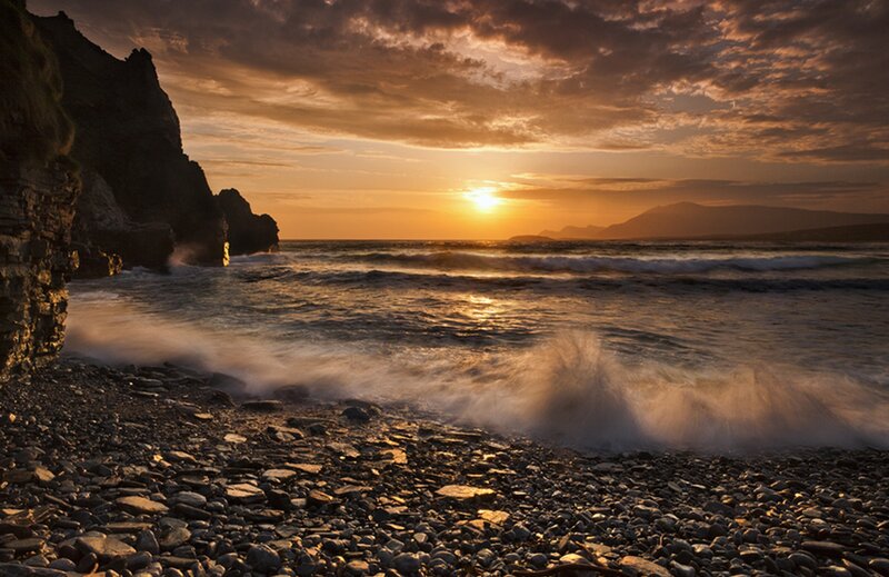 Waves Crashing on Rocky Shore — Orange
