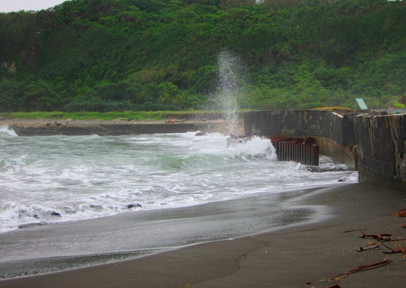 Waves Crashing on Seawall — Green
