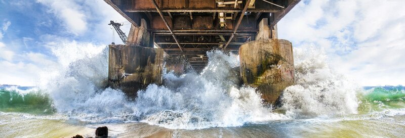 Waves Crashing under Pier — Blue, Dramatic