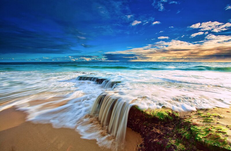 Waves Flowing over Rocks — Blue, Dramatic, Sunset