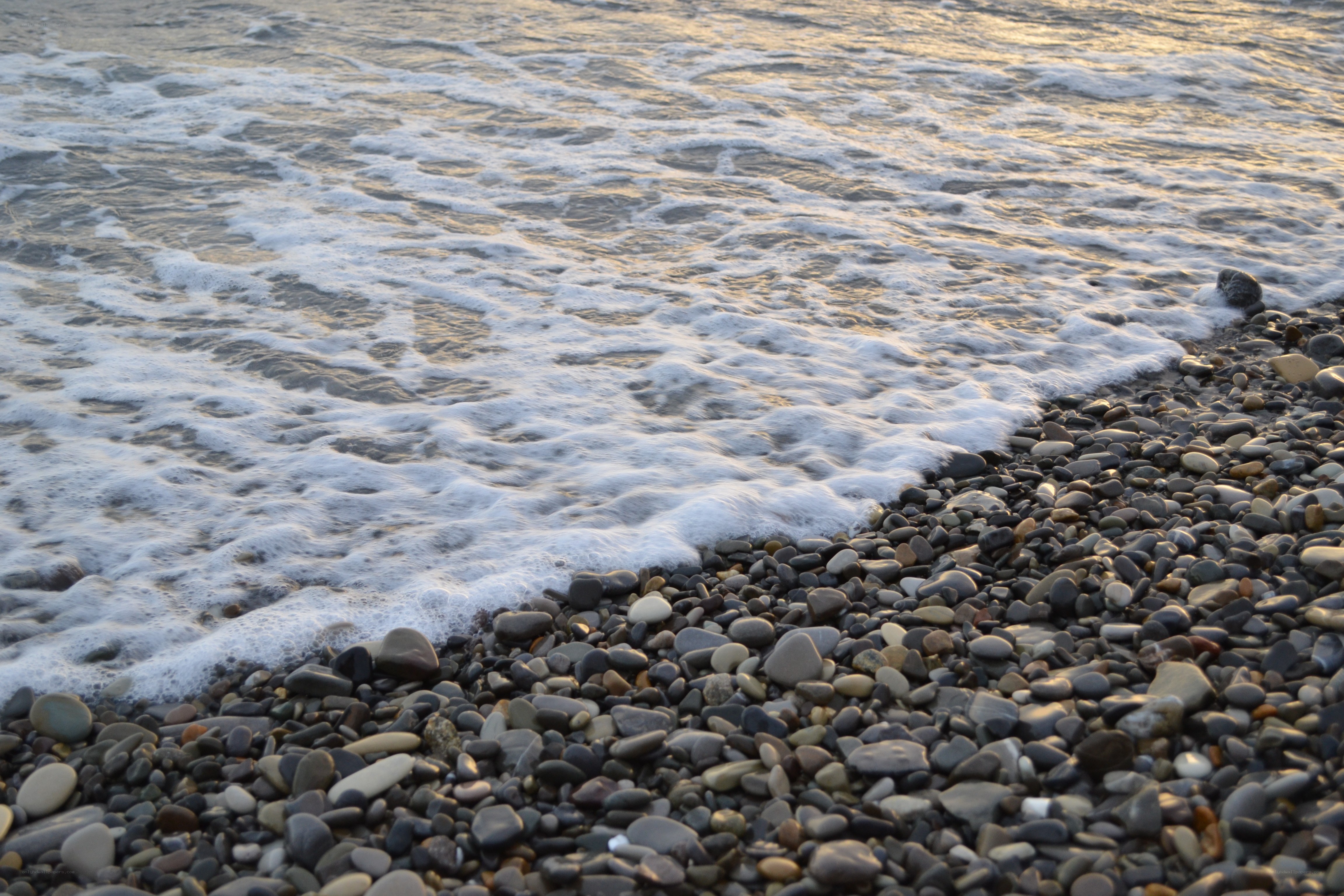 Waves on a pebble beach
