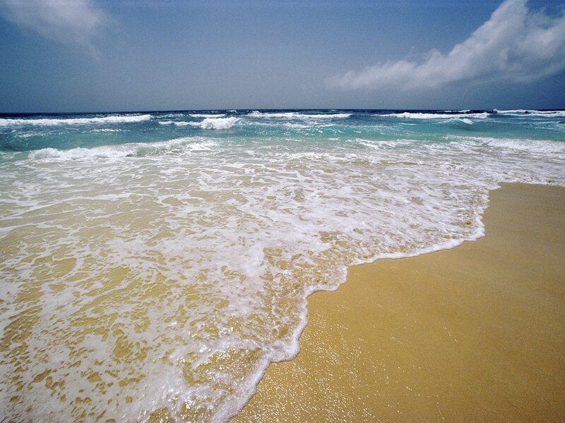 Waves on a sandy beach