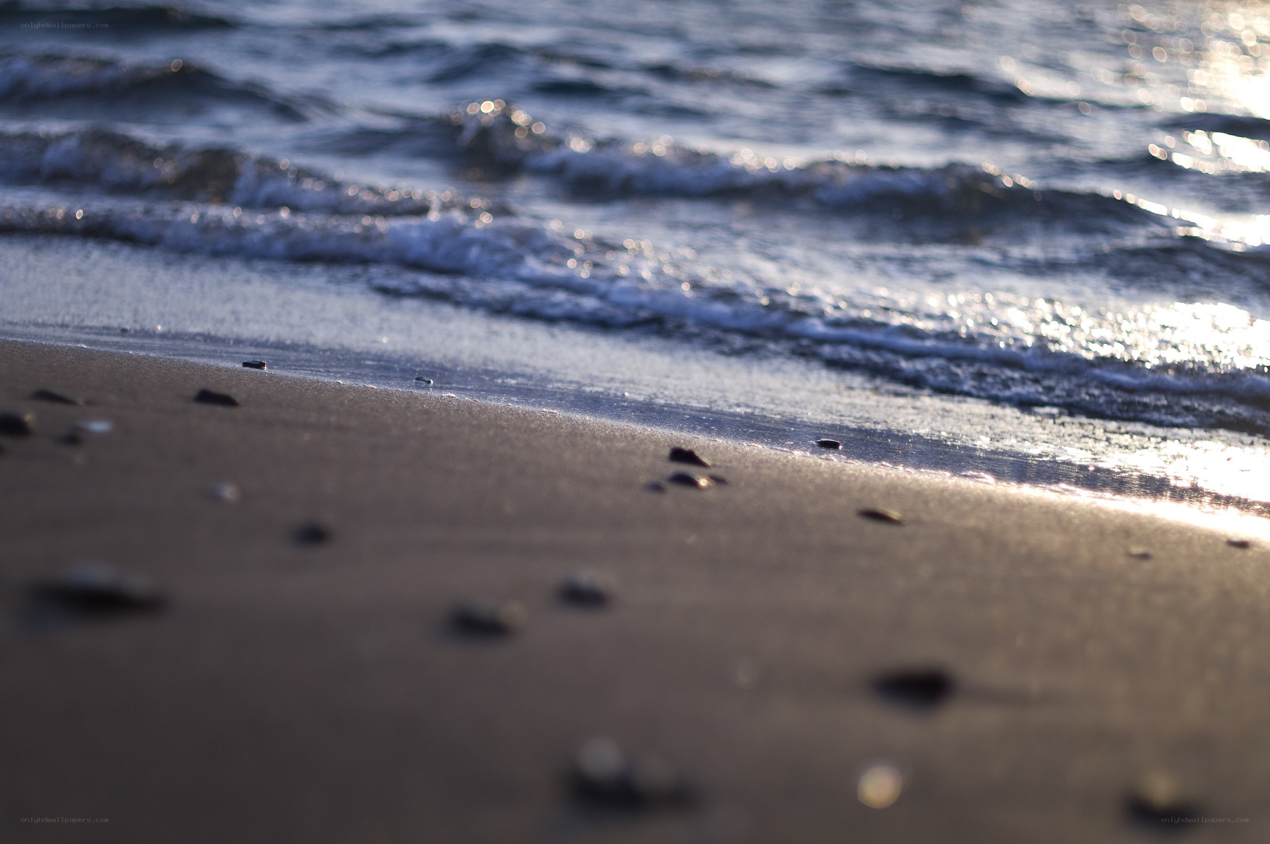 Waves on a sandy beach