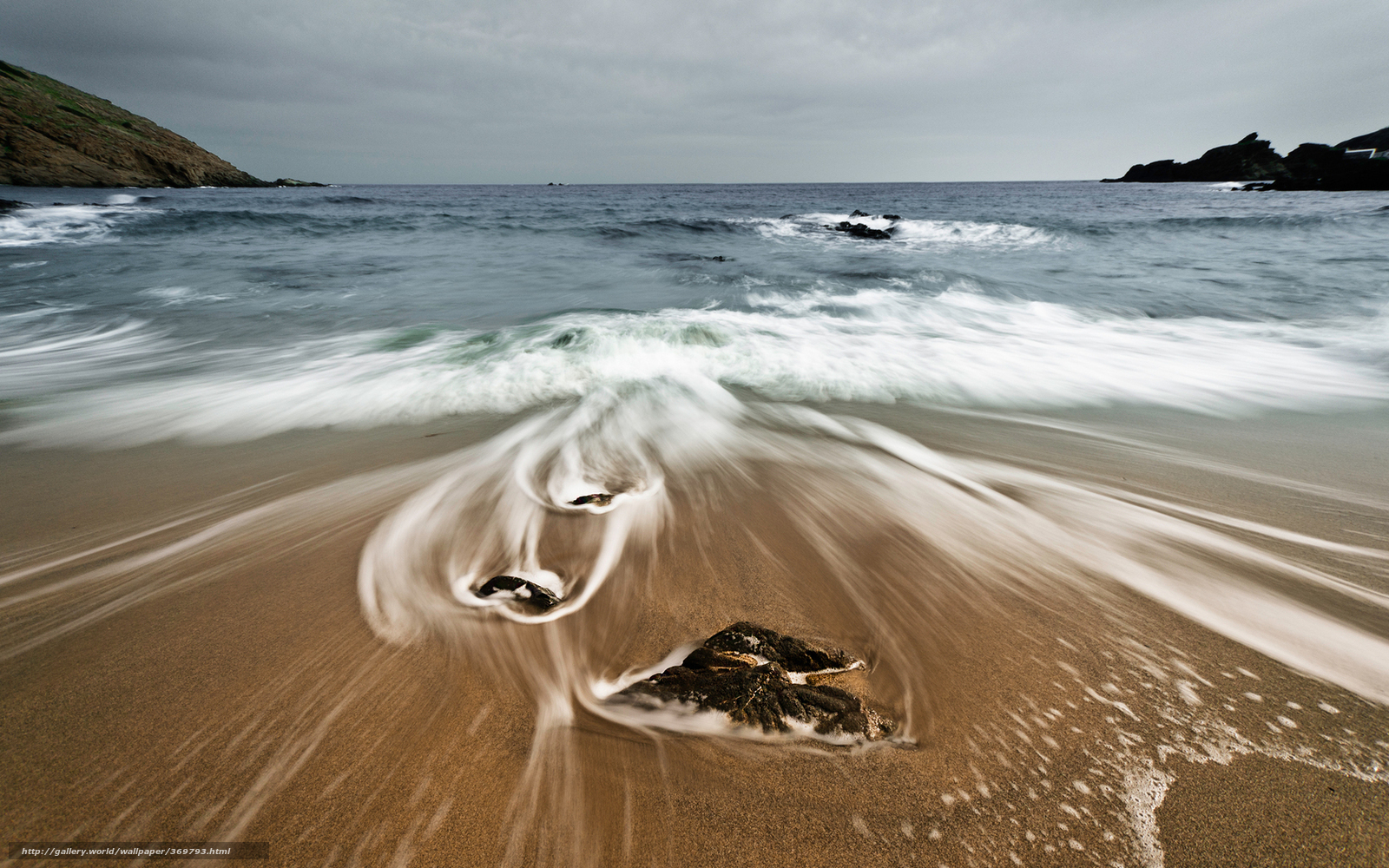 Waves on a sandy beach