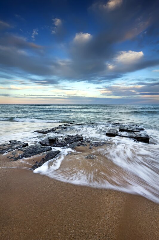 Waves on Rocky Beach — Blue, Dramatic, Sunset