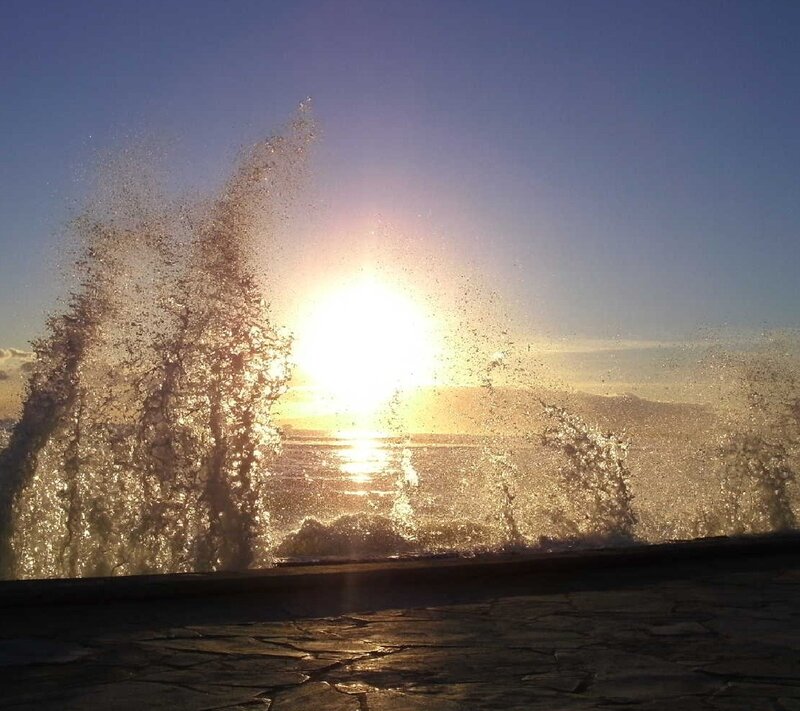 Waves Splashing at Sunset