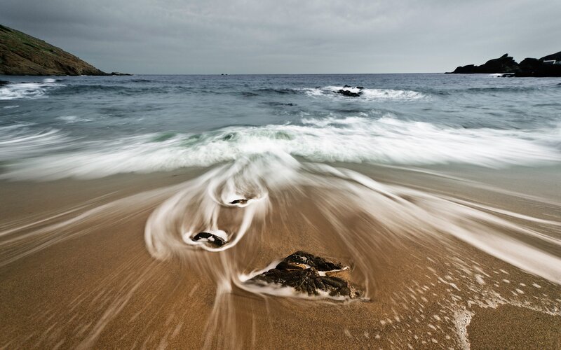 Waves washing over beach
