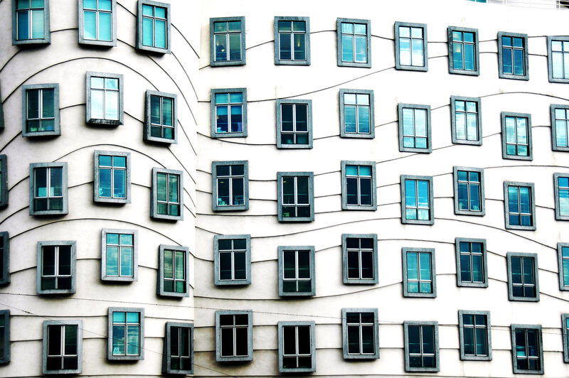 wavy building facade with windows