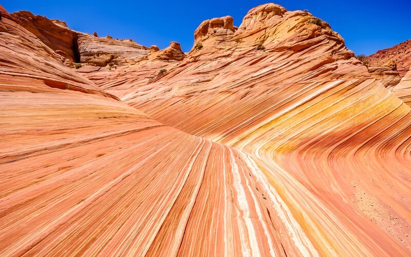 Wavy Sandstone Formations — Orange, Dramatic
