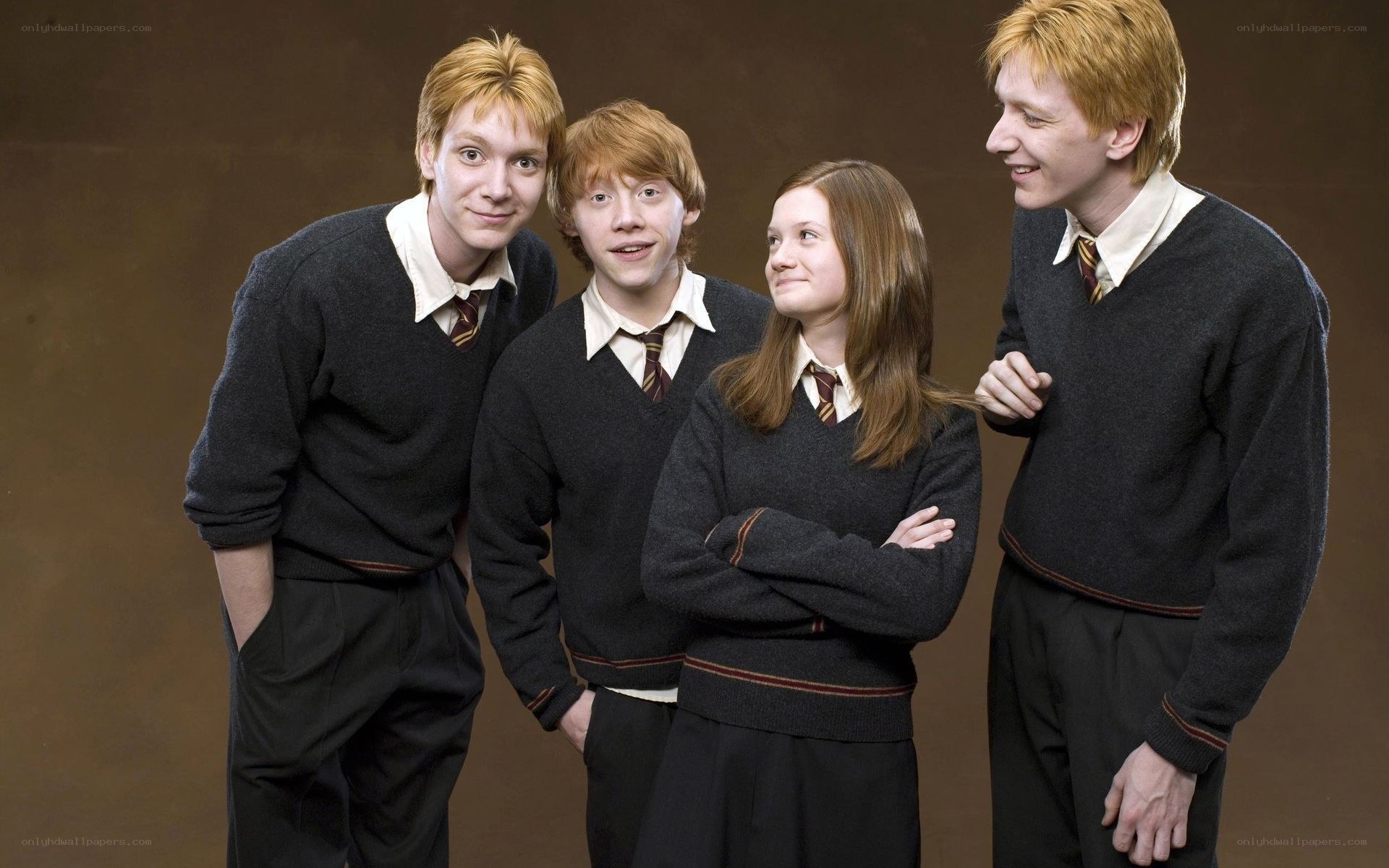 Weasley siblings in school uniforms
