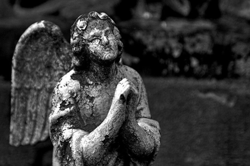 Weathered angel statue