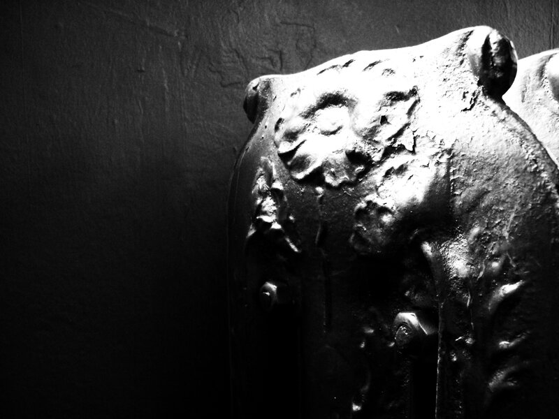 weathered bear sculpture