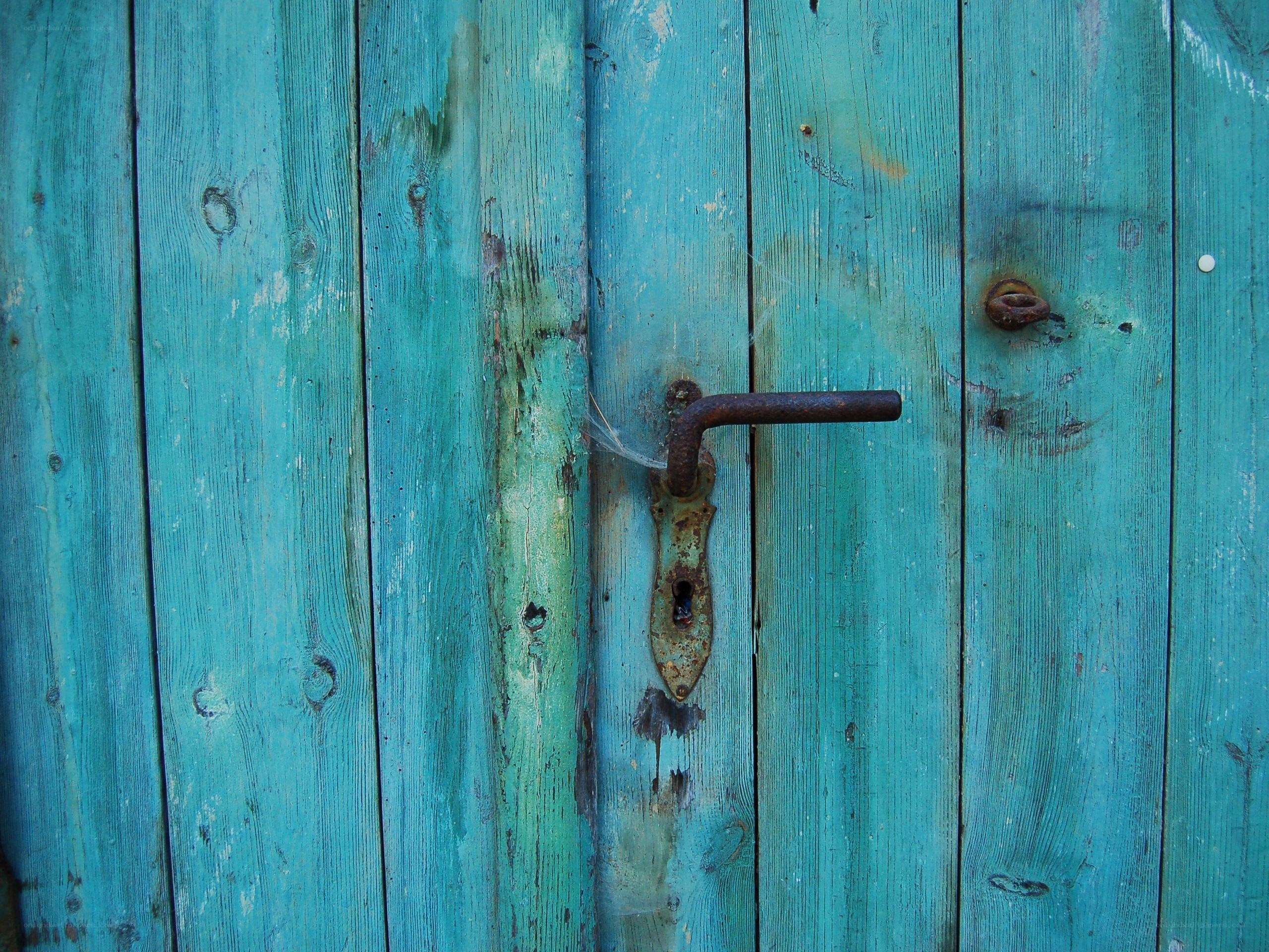 weathered blue wooden door