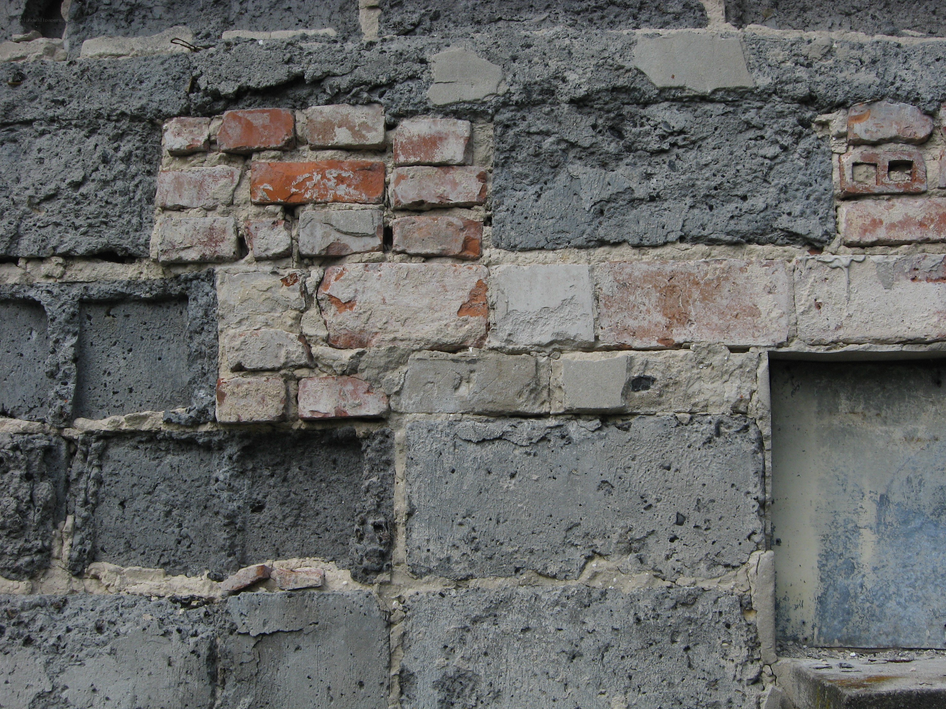 weathered brick and concrete wall