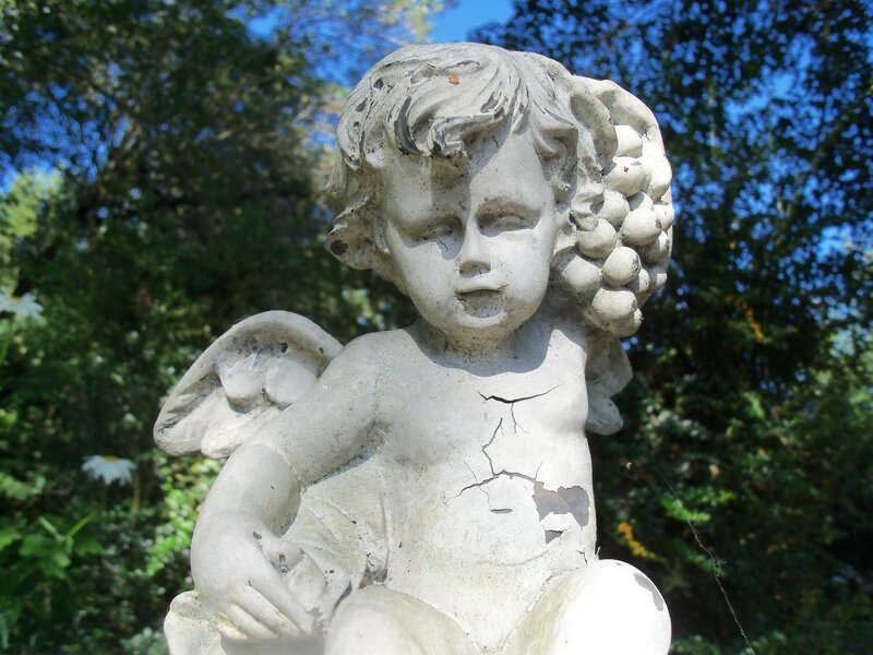 Weathered Cherub Statue