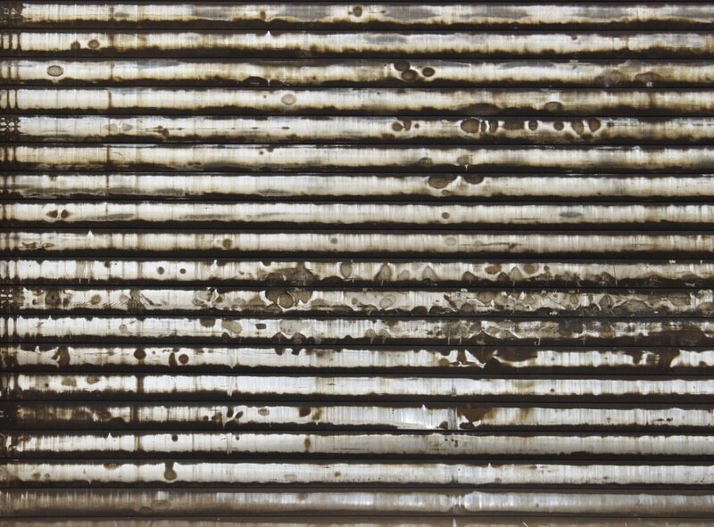 Weathered corrugated metal surface