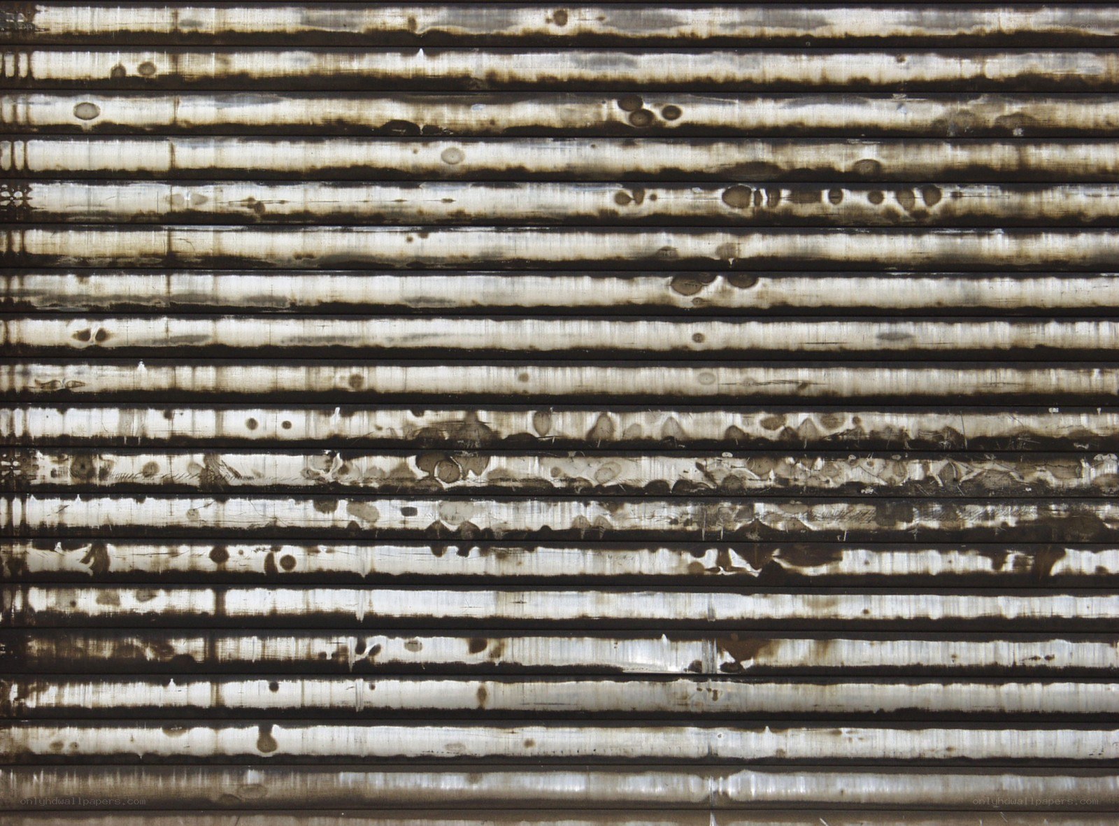 Weathered corrugated metal surface