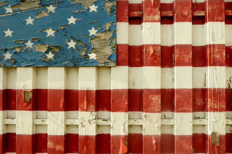 Weathered Flag on Wood