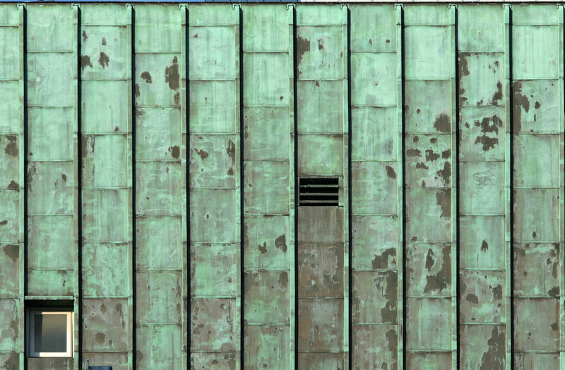 weathered green copper wall