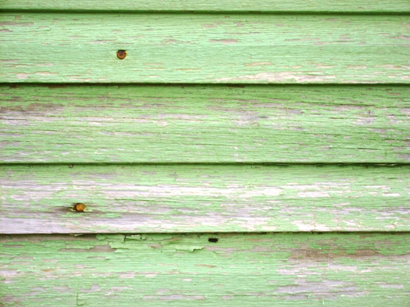 weathered green wooden planks