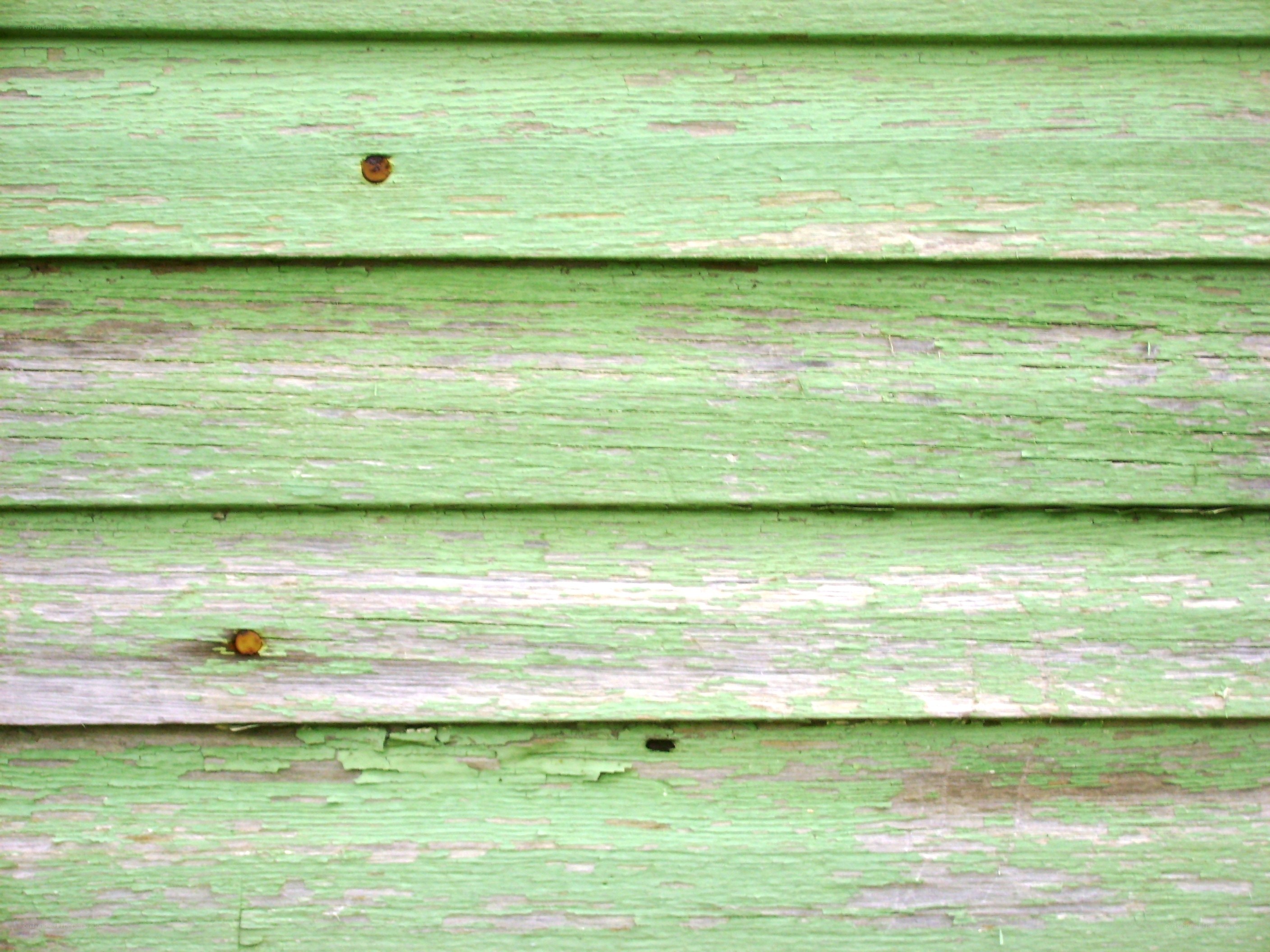 weathered green wooden planks