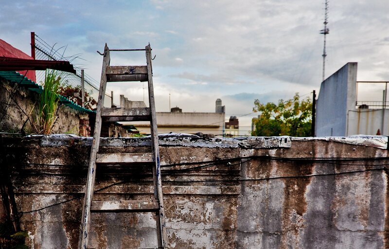 Weathered ladder on a rooftop