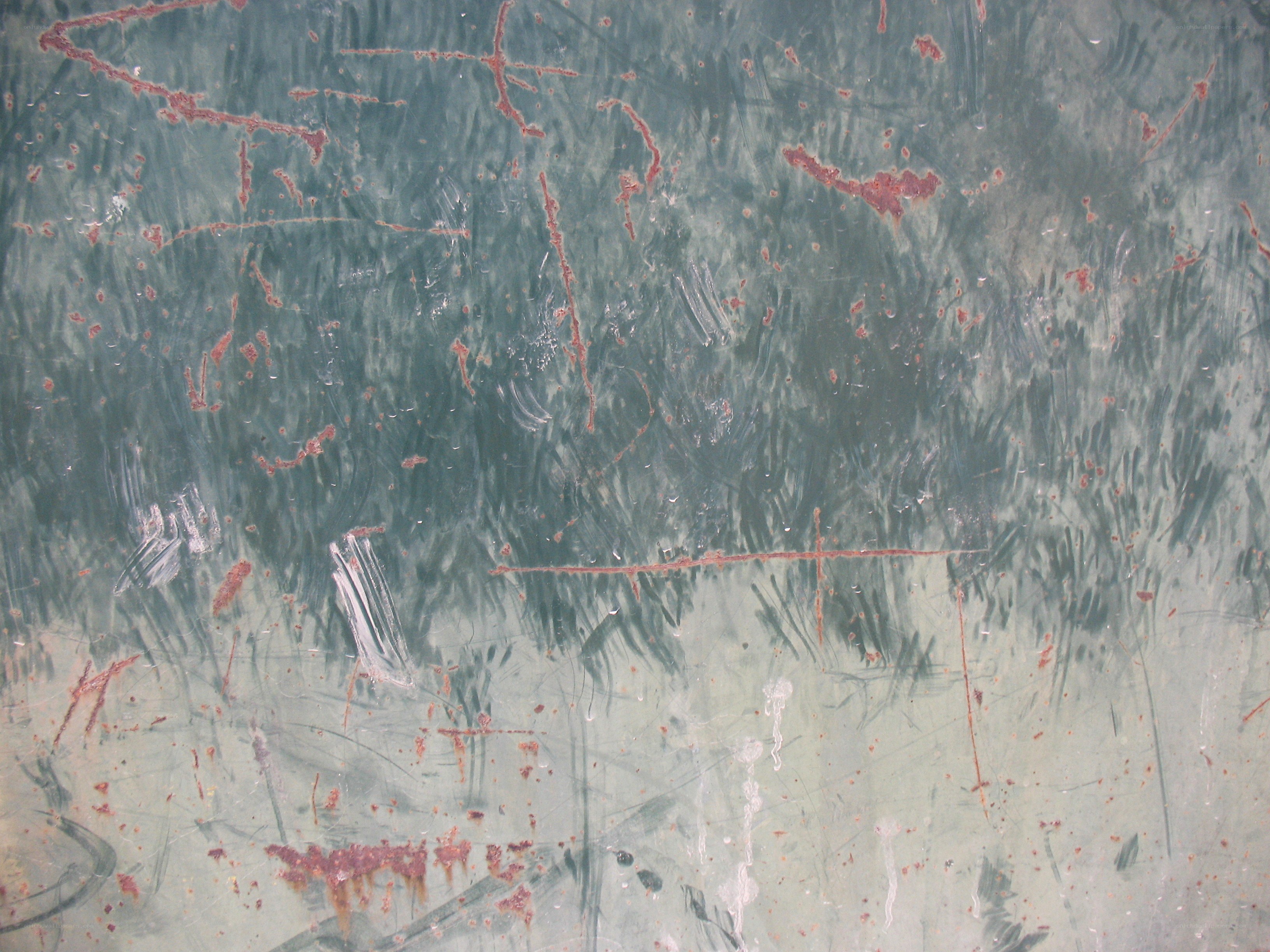 weathered metal surface with scratches